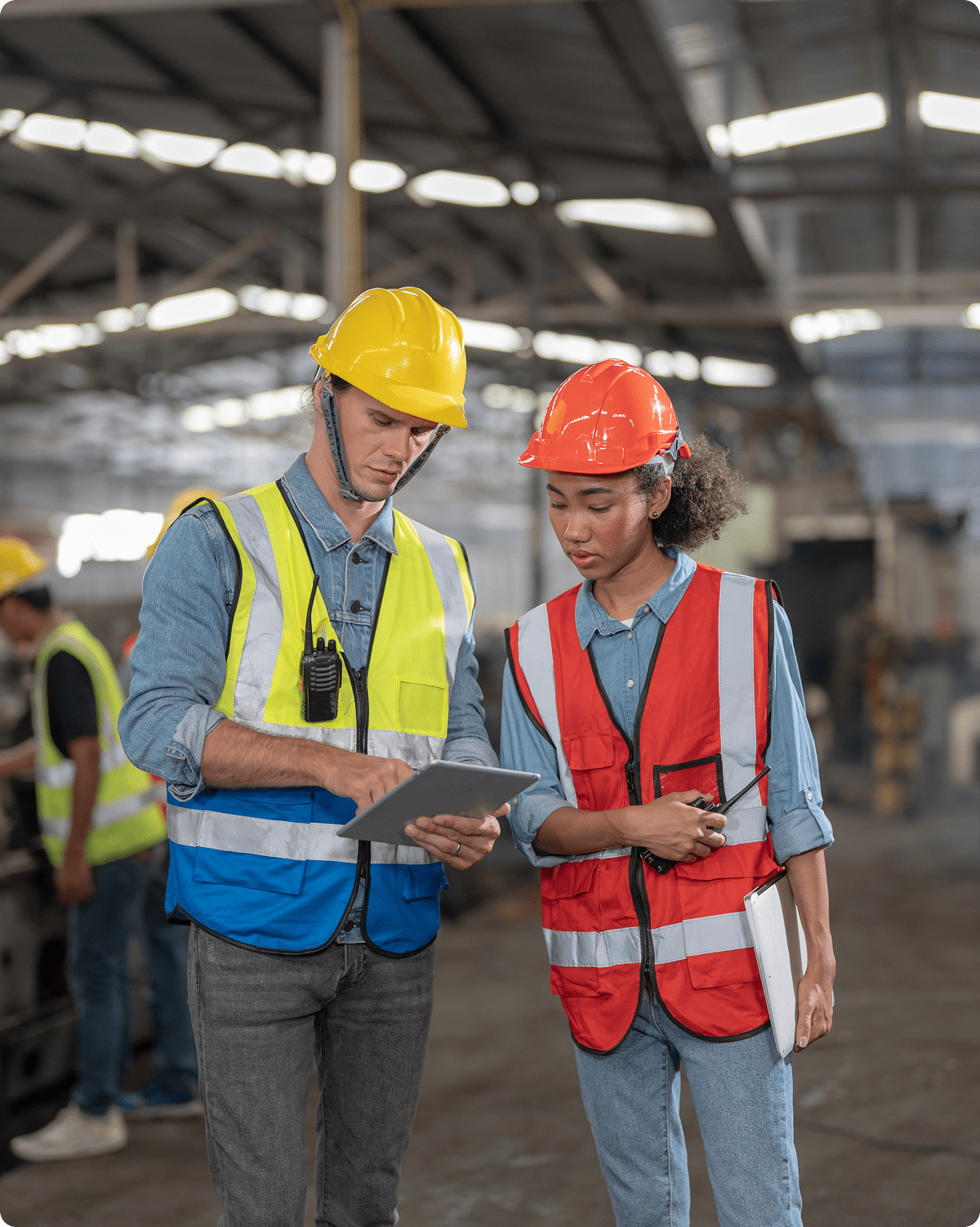 Workers discussing in a factory